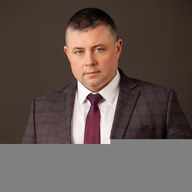 Максим Харников